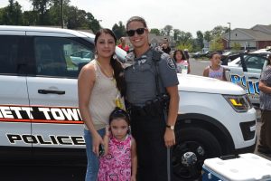 Julianna Herrera (left) poses with her 4-year-old daughter, Juliana, and Kennett Township Officer Amanda Wenrich.
