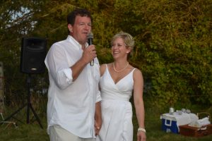 Vince Moro (left) and Elizabeth Roche welcome the crowd to Brandywine in White at Chadds Peak Farm.
