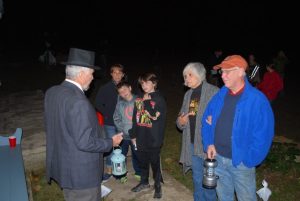 Visitors learn about the “Ticking Tomb” from Martin Wells, reenacting “Septimus Nivens,” who farmed and lived in the area many years ago.
