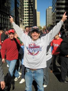David Pless is shown demonstrating his enthusiasm for the Philadelphia Phillies.