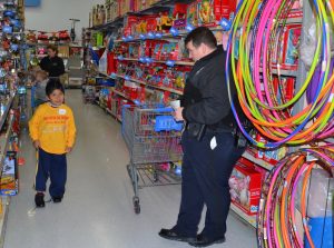 Chester County Cpl. Chris Rongaus (right) doesn't have to jump through any hoops with a shopper who knows exactly what he wants and where to find it.