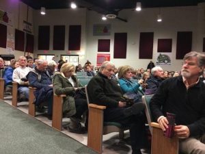 The audience listens to a presentation of the Crebilly Farm plan options during a Westtown Township Planning Commission meeting held at Stetson Middle School.