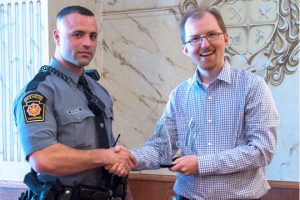 Read more about the article Rotary honors trooper, learns texting dangers