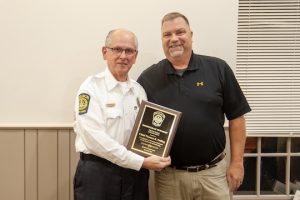 Read more about the article Top cop honored; taxes raised