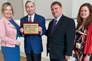 Read more about the article Symphony president honored again