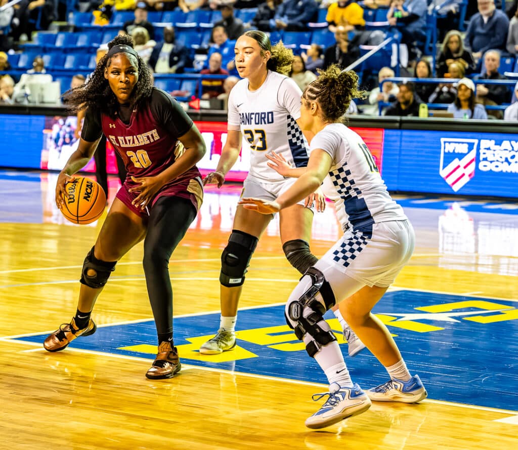 Viking senior Skylar Bolden working in the post against the Sanford defense. Photo Credit: Dave Reeder