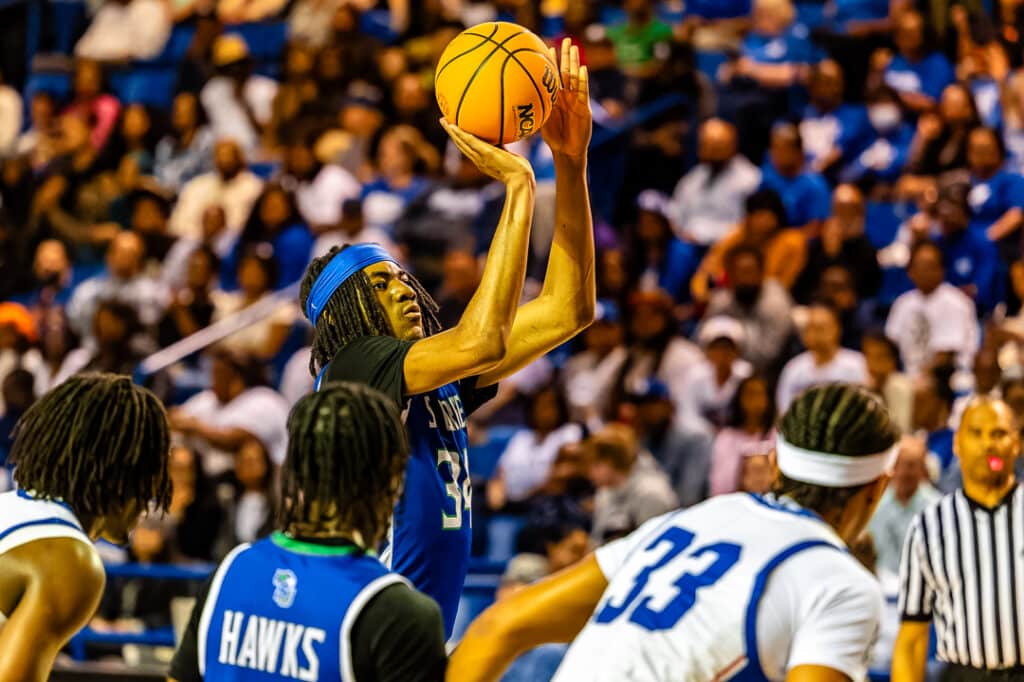 St. Georges senior Joshua Obiora concentrates on knocking down his free throws against Dover in the semifinals. Photo Credit: Dave Reeder