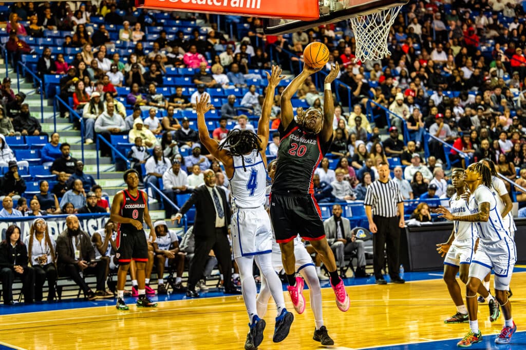 William Penn senior Mu'adh Ibn Jaabir-Johnson going up for a layup in the second semifinal game Wednesday night. Photo credit: Dave Reeder