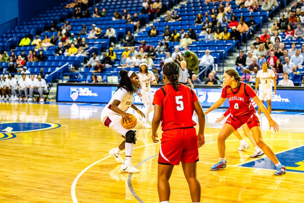 St. Elizabeth senior Skylar Bolden dribbling against the Ursuline defense at the Bob Carpenter Center. Photo Credit: Dave Reeder