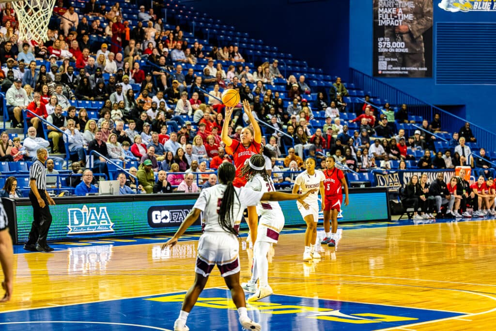 Ursuline senior Naiya Murphy rises up from the mid-range against St. Elizabeth. Photo Credit Dave Reeder.